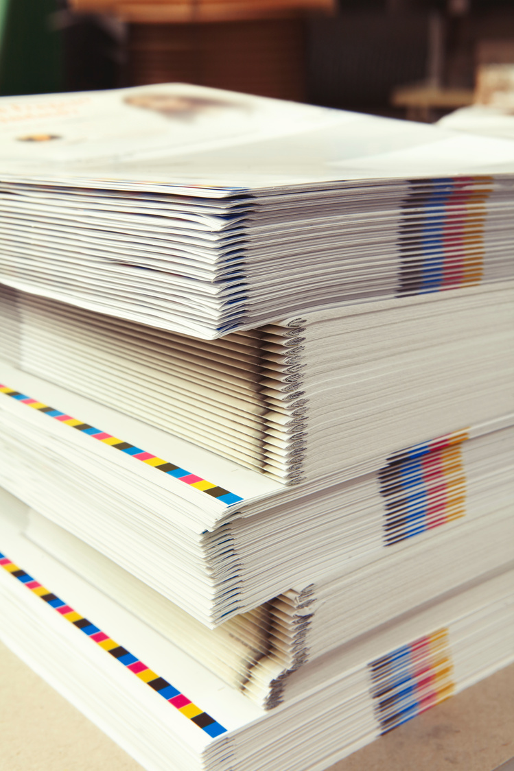 Stack of printed folders in the printing plant